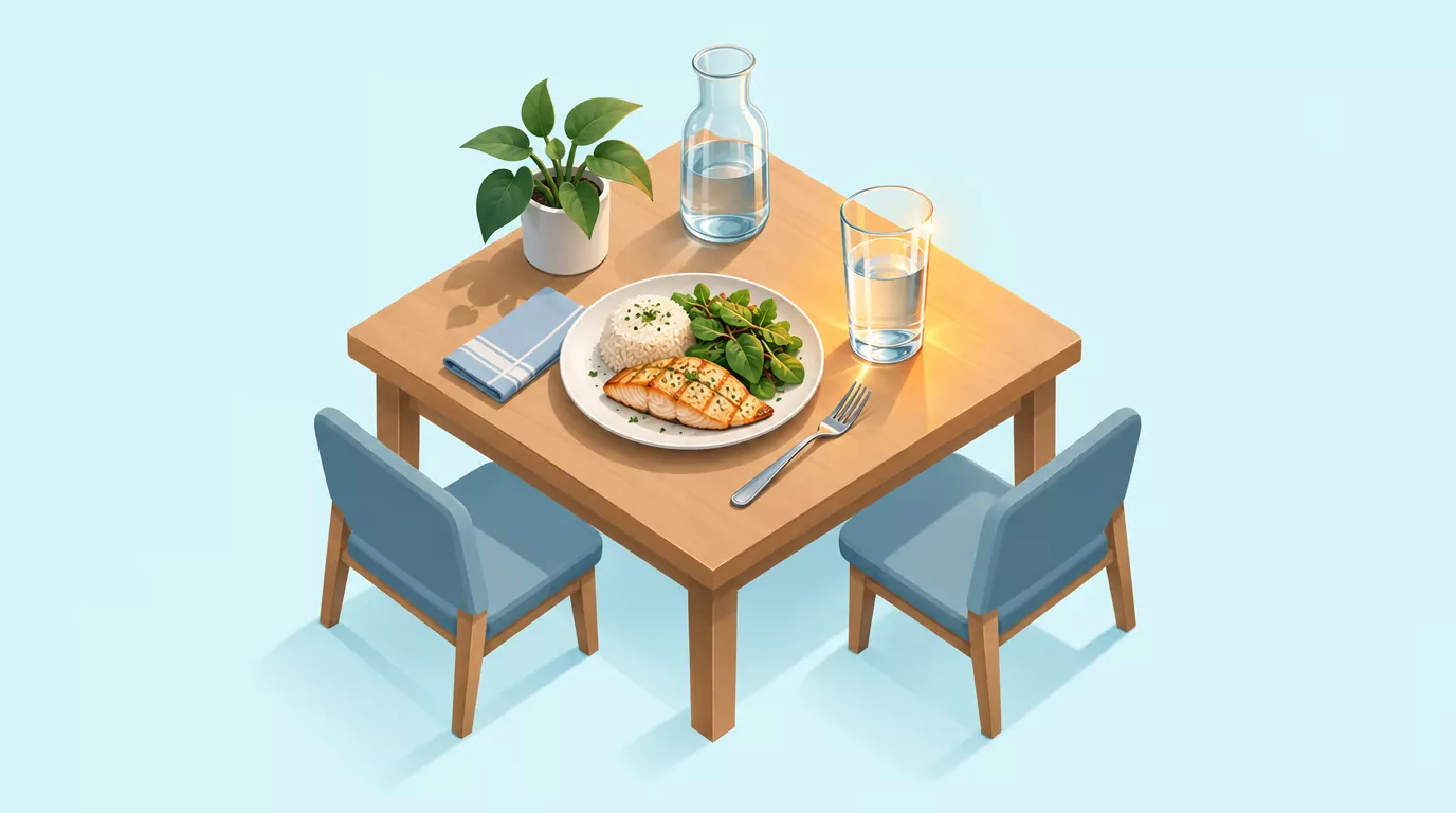 Is it bad to drink water while eating? A glass of water beside a plate of food